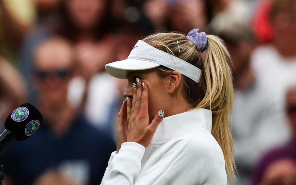 Britain's Katie Boulter cries after winning Czech Republic's Karolina Pliskova at the end of their women's singles tennis match on the fourth day of the 2022 Wimbledon Championships at The All England Tennis Club in Wimbledon, southwest London, on June 30, 2022. - GETTY IMAGES