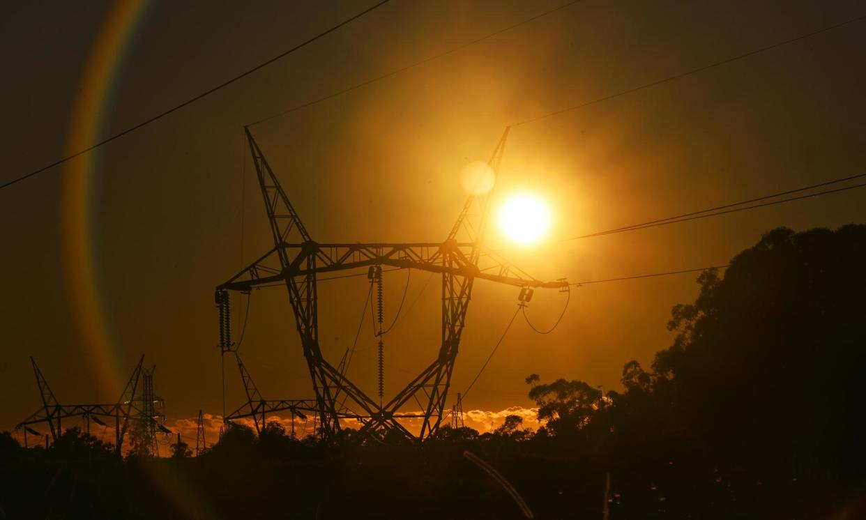 <span>Investors need a ‘certain, credible and consistent’ energy policy framework, says statement from business and farming groups.</span><span>Photograph: Dave Hunt/AAP</span>