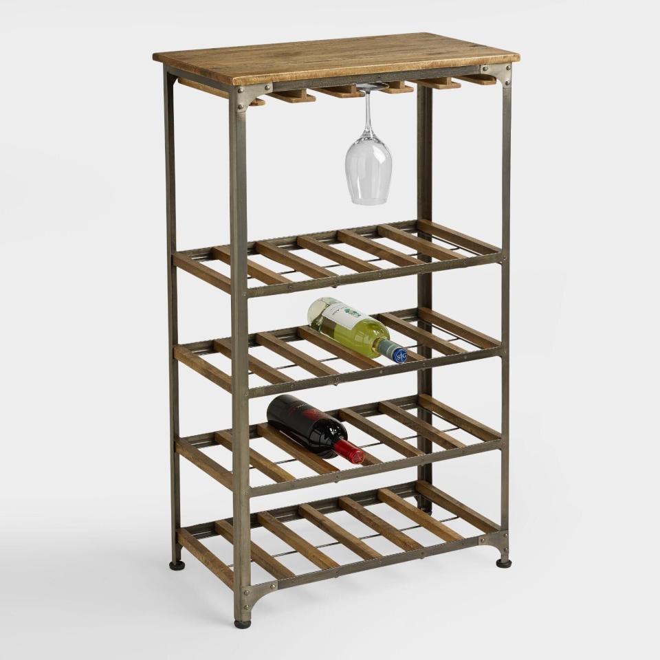 Made of rustic metal and mango wood, this wine rack can carry 24 bottles of wine and hold up to 15 wine glasses. So now you can get back some space on your shelves. <a href="https://fave.co/3m6ZuyN" target="_blank" rel="noopener noreferrer">Find it for $160 at World Market</a>.