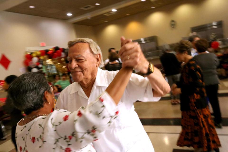 Jose Calderon, 91, and his wife Francisca, 70, enjoy a dance