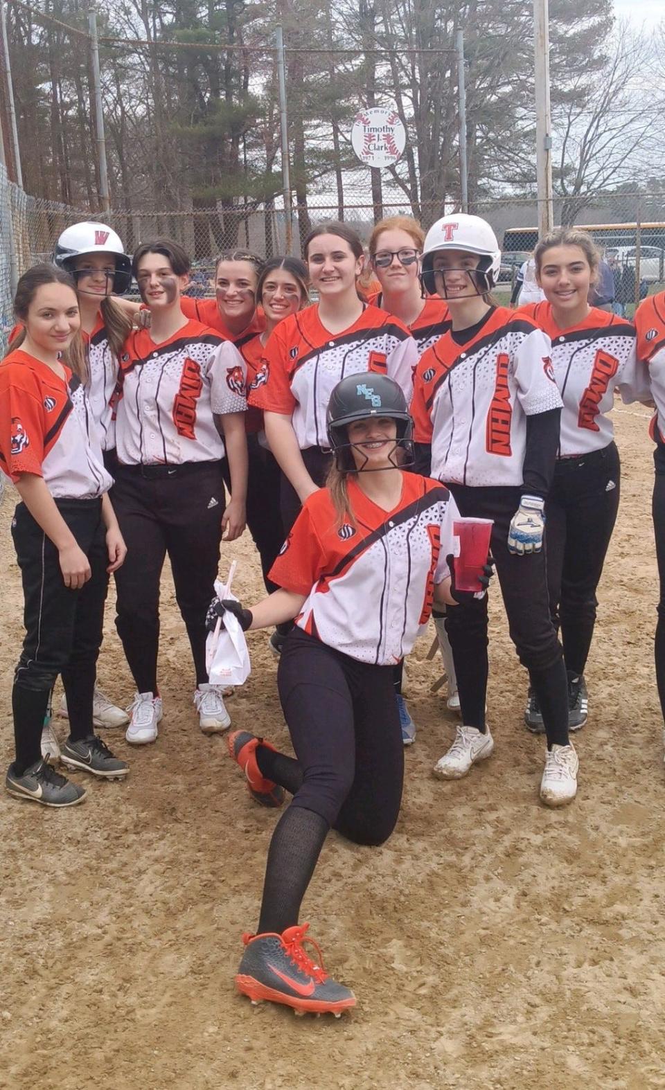 Members of the Diman softball team poses for a photo prior to Thursday's Mayflower Large game with Bristol-Plymouth