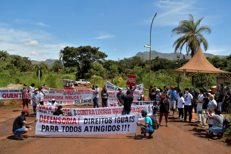 FILE PHOTO: People affected by the disaster of the tailings dam owned by Brazilian mining company Vale SA, protest in front of the company, two years after it collapsed in Brumadinho