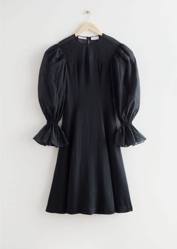 <p>& Other Stories x Rejina Pyo Organza Sleeve Silk Midi Dress, $249, <a href="https://rstyle.me/+mbC7lCeocw_g6HBysD8J8Q" rel="nofollow noopener" target="_blank" data-ylk="slk:available here;elm:context_link;itc:0;sec:content-canvas" class="link ">available here</a> (sizes US 0-12). </p>