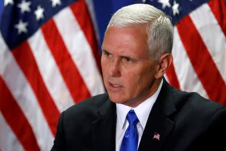 Republican vice presidential nominee Mike Pence holds a joint news conference with U.S. House Speaker Paul Ryan (R-WI) (not pictured) following a House Republican party conference meeting in Washington, U.S. September 13, 2016. REUTERS/Jonathan Ernst