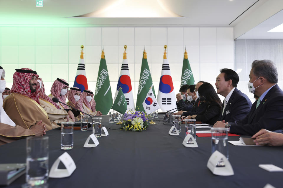 Saudi Arabian Crown Prince Mohammed bin Salman, left, talks with South Korean President Yoon Suk Yeol, second from right, during a meeting at the presidential residence in Seoul, South Korea, Thursday, Nov. 17, 2022. (South Korean Presidential Office/Yonhap via AP)