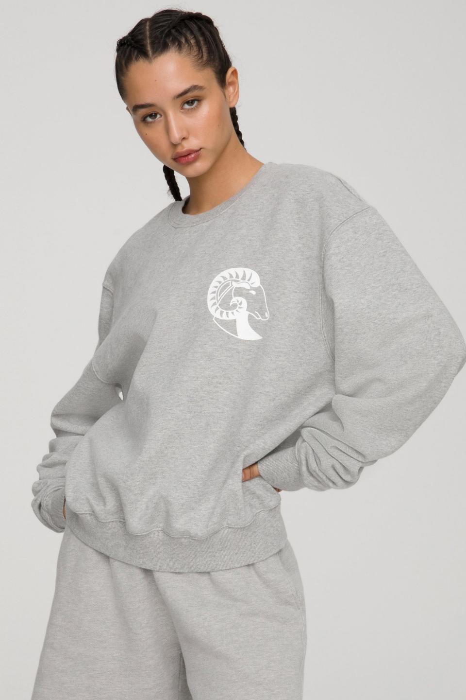 The Sagittarius Zodiac Set by Good American. Sweatshirt, $124 and sweatpants, $105.  