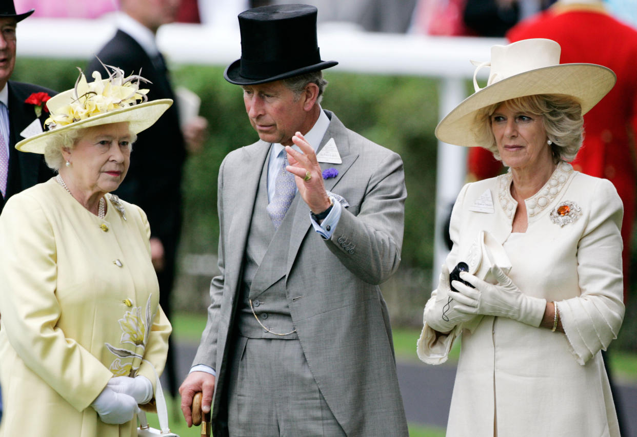 Queen Elizabeth II, Camilla, Duchess of Cornwall and Prince Charles, Prince of Wales chat together on the second day of Royal Ascot Races on June 20, 2007 in Ascot, England. (Tim Graham / Getty Images)