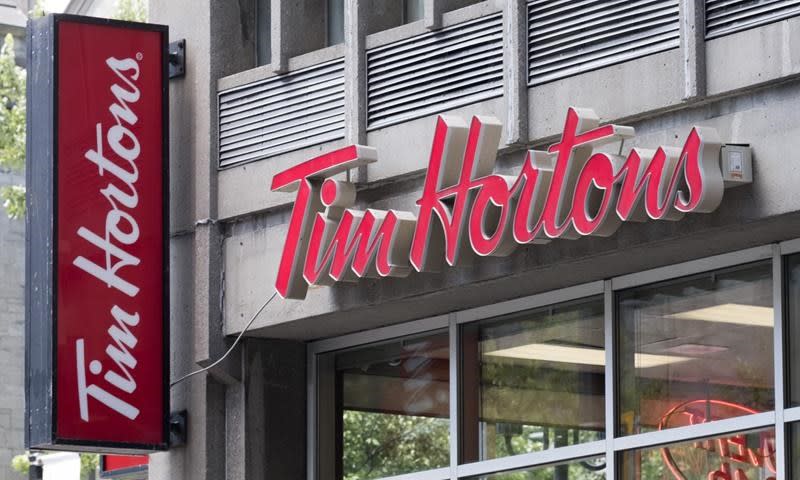 The parent company of Tim Hortons narrowly topped profit expectations for its fourth quarter. (The Canadian Press)