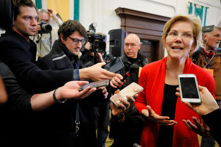 Democratic 2020 U.S. presidential candidate and U.S. Senator Elizabeth Warren (D-MA) answers questions from reporters after speaking at Plymouth State University in Plymouth, New Hampshire, U.S., February 23, 2019. REUTERS/Brian Snyder