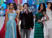 <b>Miss Universe 2012 <br></b><br>Runner-up Miss Phillipines Janine Tugonon and 3rd place Miss Venezuela Irene Sofia Esser Quintero join Train singer Pat Monahan on stage.<br><br>© Getty