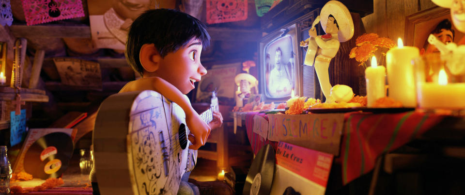 This simple scene of Miguel watching Ernesto de la Cruz perform is one of producer Darla Anderson’s favorite moments in <i>Coco</i>. (Photo: Walt Disney Studios Motion Pictures/courtesy Everett Collection)