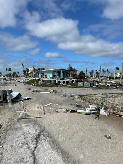 Not far from where Matt and Trish Oakley live on Fort Myers Beach is the Mid-Island Laundry and Car Wash. After the storm Matt took this photo of the washing machines and dryers which were pushed out of the building by the storm surge.