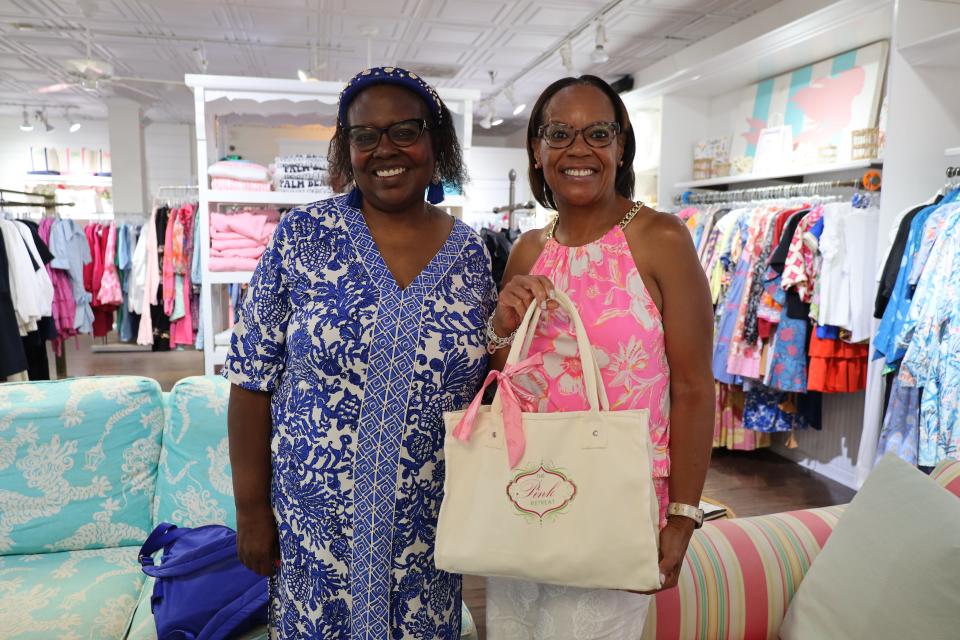 Lilly Pulitzer fans Jill Flewitt, left, and Michelle Strong from the Philadelphia area attended the "Spilling the Juice" event at C. Orrico on South County Road. This was Strong's first year, and Flewitt is "an original" who attended the first Pink Retreat.