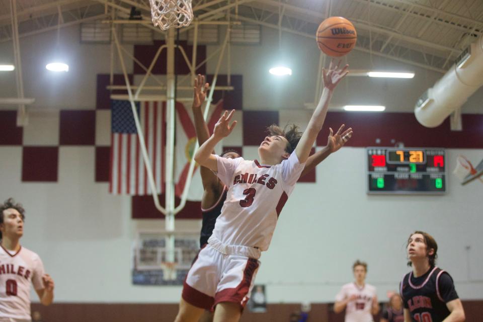 Chiles senior Kellen Quiggins (3) goes up for a lay up in a game between Leon and Chiles on Jan. 20, 2023, at Chiles High School. The Timberwolves won, 56-53.