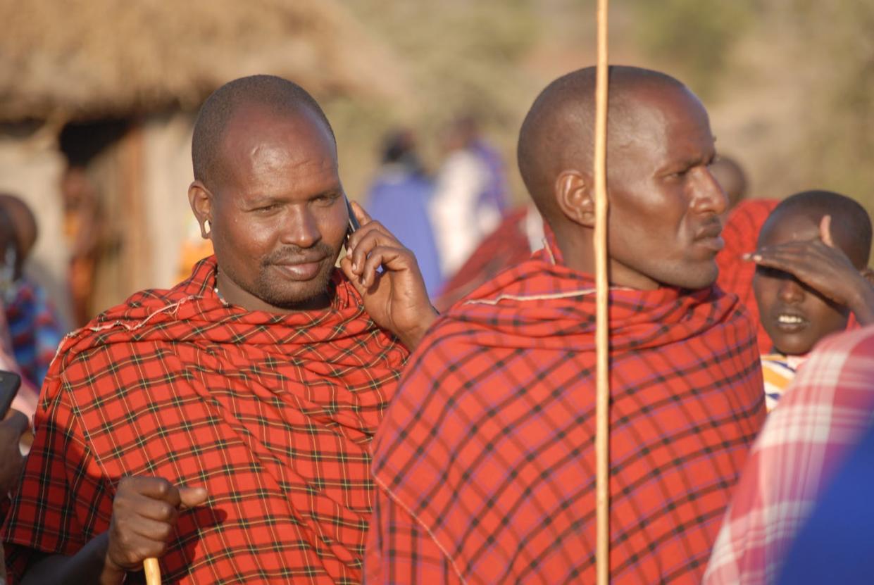 <span class="caption">A Maasai man receives a call on his mobile phone.</span> <span class="attribution"><span class="source">Timothy D. Baird/Virginia Tech</span>, <a class="link " href="http://creativecommons.org/licenses/by-nd/4.0/" rel="nofollow noopener" target="_blank" data-ylk="slk:CC BY-ND;elm:context_link;itc:0;sec:content-canvas">CC BY-ND</a></span>