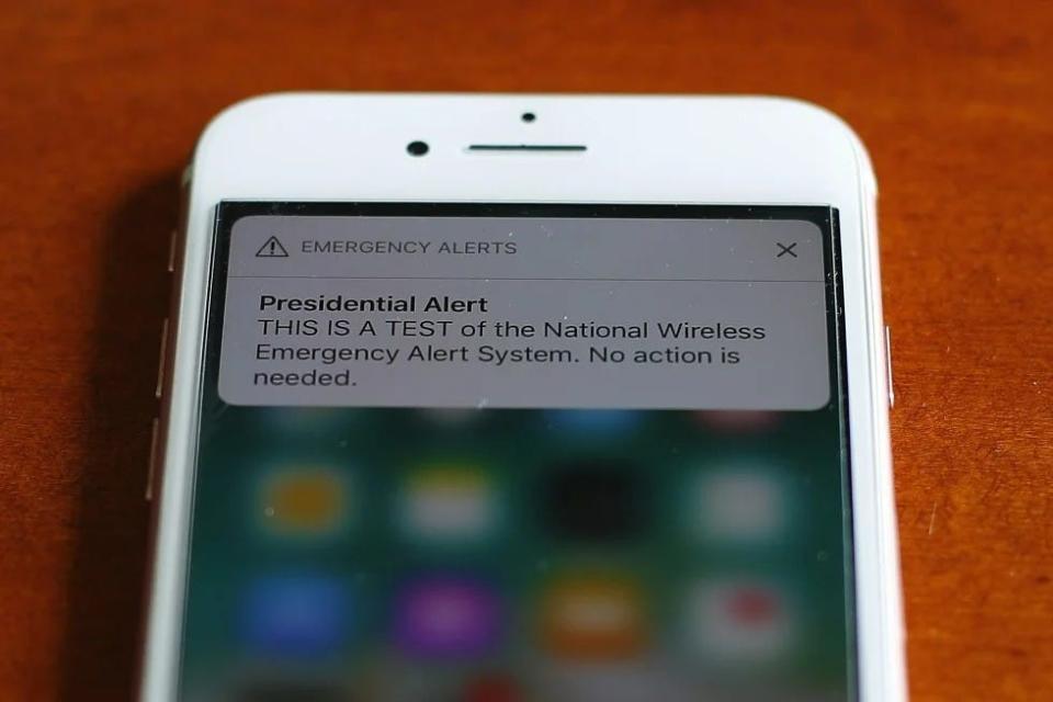 The first test of the national wireless emergency system by the Federal Emergency Management Agency is shown on a cellular phone in Detroit, Wednesday, Oct. 3, 2018. The Associated Press on Monday, Sept. 25, 2023 reported on social media posts falsely claiming that FEMA’s emergency alert system test on Oct. 4 will send a signal to cell phones nationwide in order to “activate” nanoparticles such as graphene oxide that have been introduced into people’s bodies.