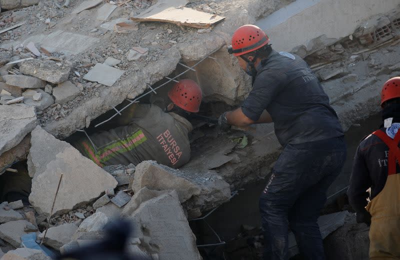 Rescue operations take place on a site after an earthquake struck the Aegean Sea, in the coastal province of Izmir