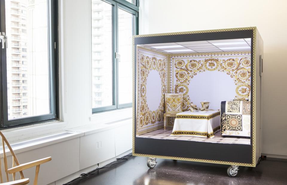 The miniature photo-booth room, designed by Donatella Versace.