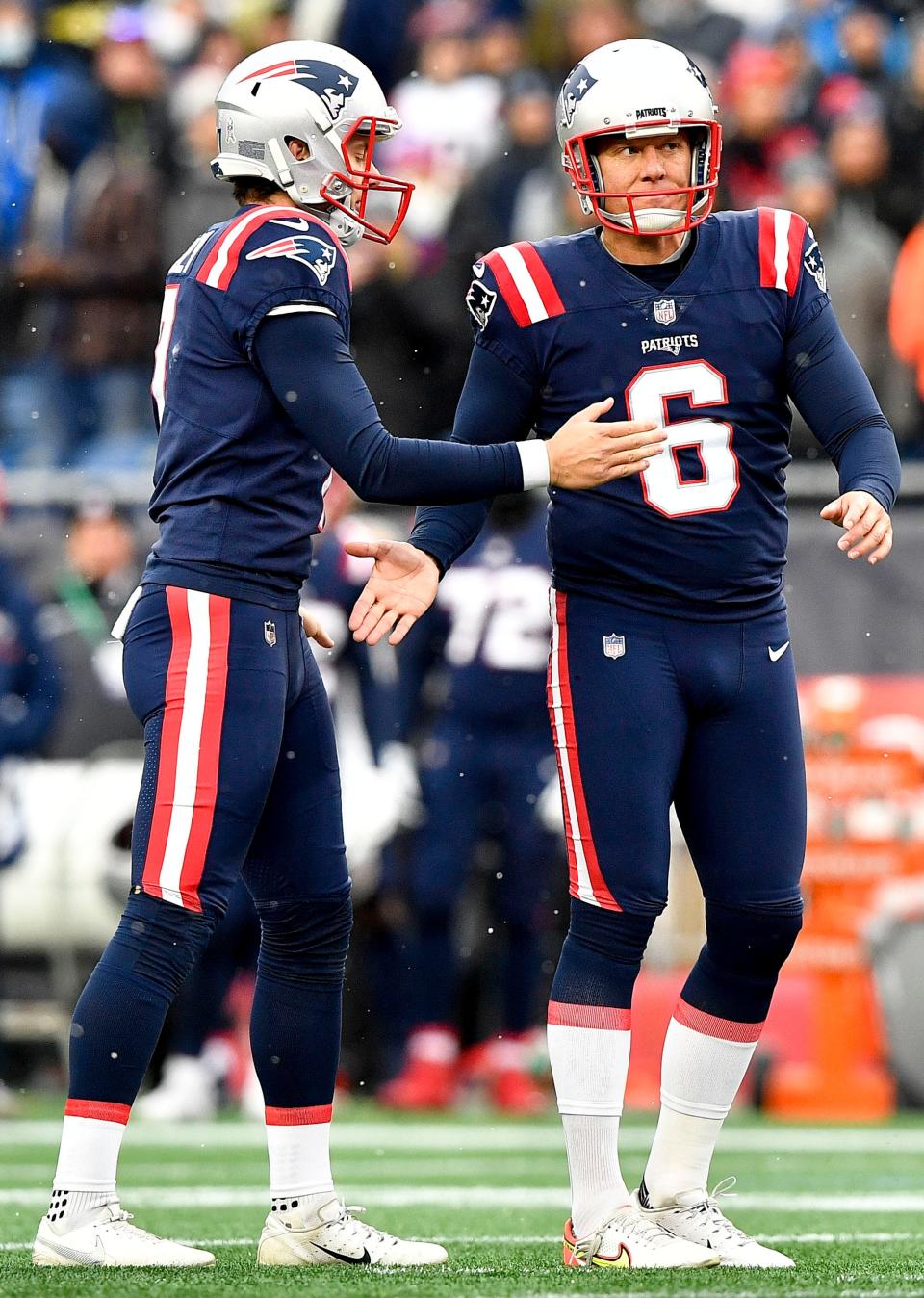 Patriots kicker Nick Folk, right, celebrates a field goal during the second quarter Sunday in Foxboro.