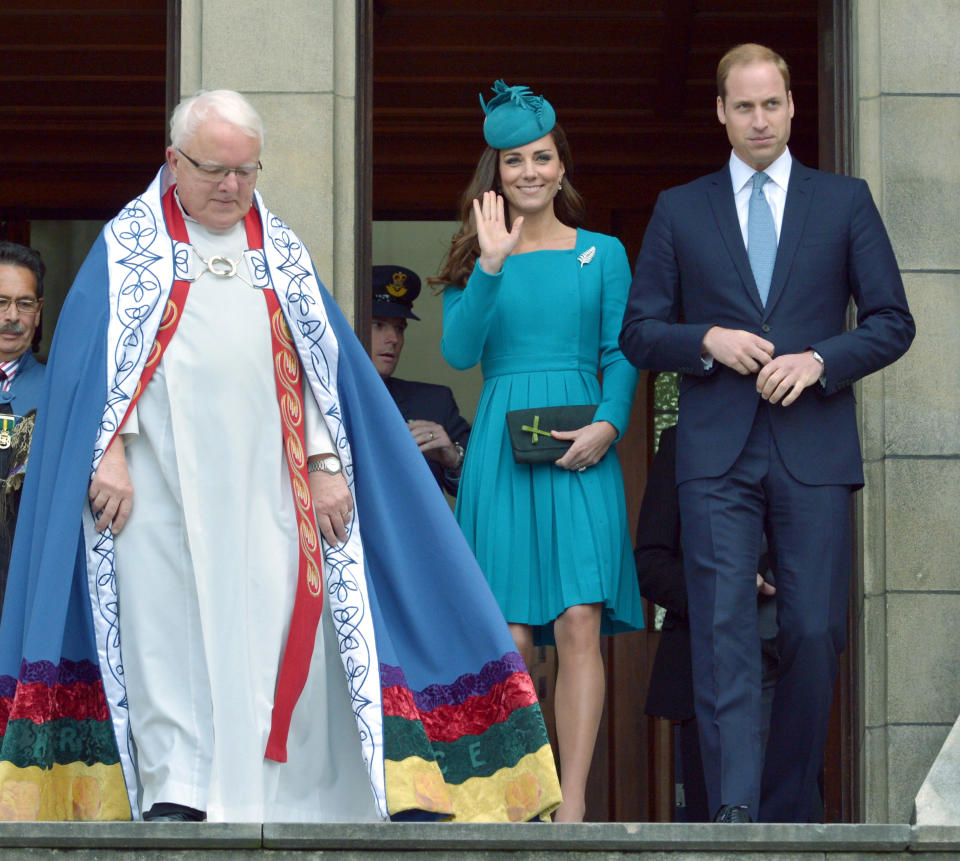Britain's Prince William, right, and his wife Kate, the Duchess of Cambridge, center, are accompanied by the Dean of St. Paul's Cathedral, the Very Rev. Trevor James, left, after a Palm Sunday service at the Cathedral in Dunedin, New Zealand, Sunday, April 13, 2014. The royal couple are on an official visit to New Zealand. (AP Photo/Gerrard O'Brien, Pool)