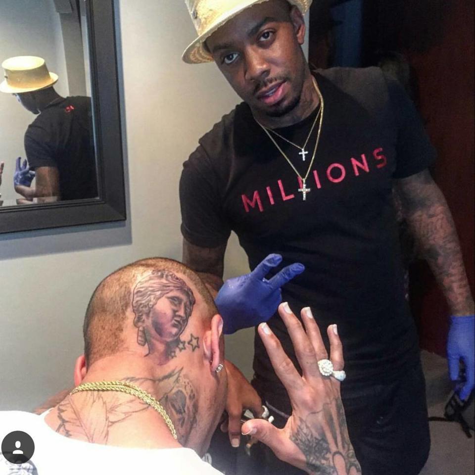 Sorry, Ed Sheeran! It looks like you've got competition in the extremely large tattoo department -- and this one features a roaring animal as well. Chris Brown took to Instagram on Wednesday to show off a brand new head piece. The ink, which was done by Bronx tattoo artist King Rico, features a bull and a woman's face. <strong>WATCH: Chris Brown Almost Pulls a Lenny Kravitz On Stage</strong> "I do what the f**k I want! #rockstar #500 #onehellofanight#legendarynights @iamkingrico," he captioned the finished product. Instagram King Rico showed off a photo of the tattoo while it was still in progress, which shows that the piece bleeds right into the stars Chris has had behind his left ear for years. The artist and his subject even took a photo together after the ink was completed, though this one is of their faces and not the back of Chris' head. Hours after having a tattoo needled drilled into a skull, Chris took the stage in New Jersey for the next stop of his <em>One Hell of a Nite Tour</em>. <strong>NEWS: Chris Brown Will Name New Album After Daughter</strong> This had to hurt at least a little bit, right? It's his <em>head</em>! The 26-year-old singer is covered nearly head to toe in tattoos, so this may have been the only space left on his -- besides his actual face -- for body art. But unlike Ed, the only way this tattoo will get hidden is if Chris grows out his hair again, not by thick makeup. If you've already forgotten, this is what the "Thinking Out Loud" singer's ink looks like when he's not hiding it for a TV show: <strong>WATCH: Seeing Double? Celebs With the Same Tattoo</strong> And that chest piece is only halfway done! Thanks for that trickery, Ed! See how the British crooner pulled off his tattoo hoax in the video below.