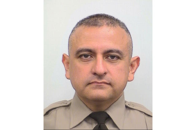 This undated image released by Maricopa County Sheriff's Office shows Deputy Juan "Johnny" Ruiz. Ruiz, a metro Phoenix sheriff's deputy who suffered grave injuries at the hands of a man he had just arrested, succumbed to injuries he suffered on Saturday, Oct. 9, 2021. Ruiz died Monday, Oct. 11, authorities said. The man accused of attacking Ruiz, 30-year-old Clinton Robert Hurley, remained hospitalized in stable condition Monday after getting in a gunfight with a homeowner. (Maricopa County Sheriff's Office via AP)
