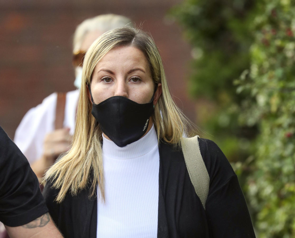 Teacher Kandice Barber, 35, leaves Aylesbury Crown Court, Buckinghamshire, after being found guilty of two sex offence charges related to sending topless Snapchat pictures to a 15-year-old student. The jury were unable to reach verdicts on three more serious charges of causing or inciting a child aged under 16 to engage in a sexual act.