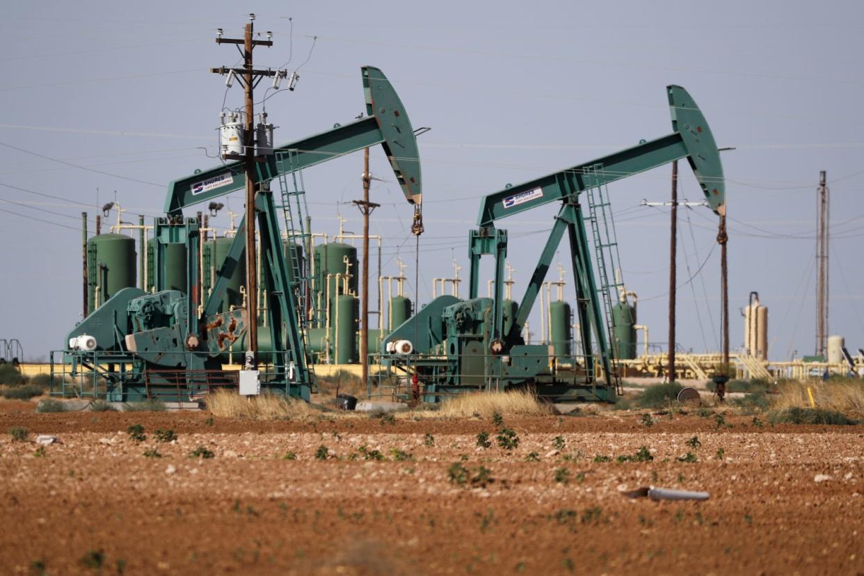 In this Wednesday, July 29, 2020 file photo, a view of a pump jack operateing in an oil field in Midland, Texas.