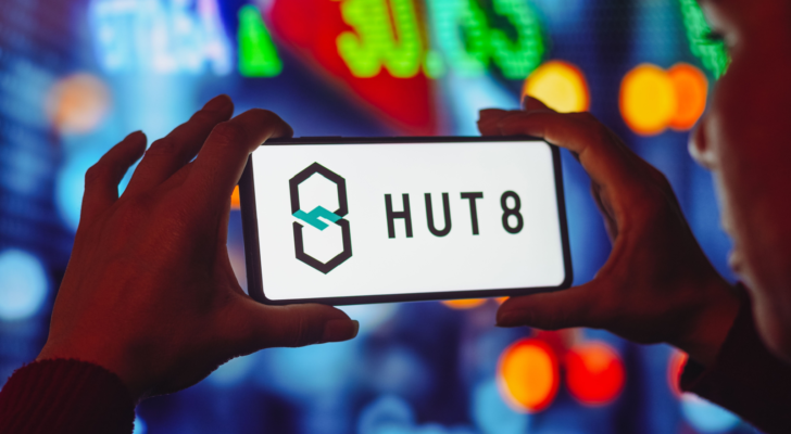 In this photo illustration the Hut 8 Mining logo seen displayed on a smartphone screen