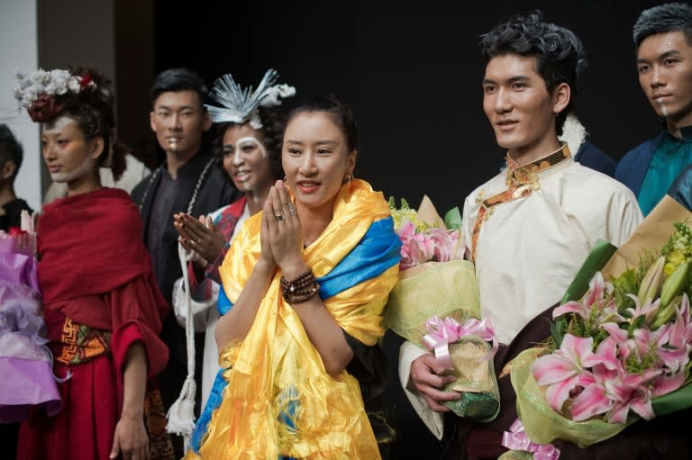 Aj-Namo (C) is the first ethnic Tibetan designer to show their work at China Fashion Week in Beijing