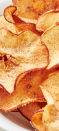 <p>Making your own apple chips is extremely easy—even without a fancy dehydrator. Pick an apple on the crisper side to make these, like Honeycrisp, Granny Smith, or Pink Lady. They'll crisp up perfectly in your air fryer in a fraction of the time as they would in the oven.</p><p>Get the <strong><a href="https://www.delish.com/cooking/recipe-ideas/recipes/a55596/healthy-apple-chips-recipe/" rel="nofollow noopener" target="_blank" data-ylk="slk:Cinnamon Apple Chips recipe;elm:context_link;itc:0;sec:content-canvas" class="link ">Cinnamon Apple Chips recipe</a></strong>.</p>