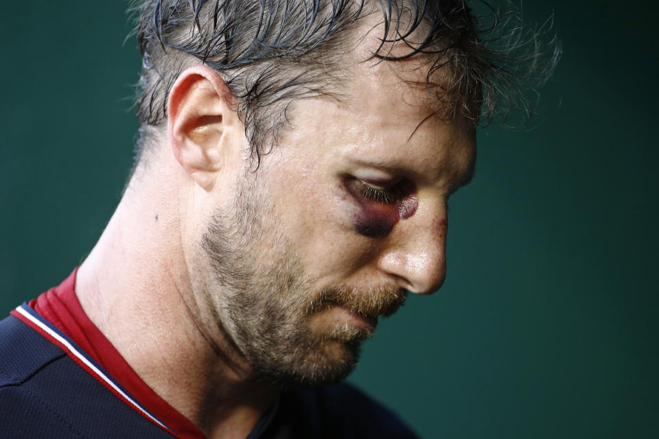 Washington Nationals starting pitcher Max Scherzer walks out of the dugout between innings of the second baseball game of a doubleheader against the Philadelphia Phillies, Wednesday, June 19, 2019, in Washington. (AP Photo/Patrick Semansky)