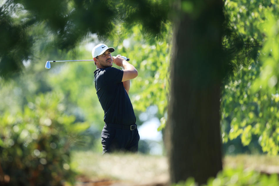 Brooks Koepka plays his shot from the 12th tee during the third round of The Memorial Tournament on July 18, 2020, at Muirfield Village Golf Club in Dublin, Ohio.