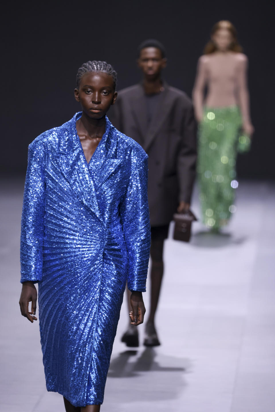 A model wears a creation for the Valentino ready-to-wear Spring/Summer 2023 fashion collection presented Sunday, Oct. 2, 2022 in Paris. (Photo by Vianney Le Caer/Invision/AP)