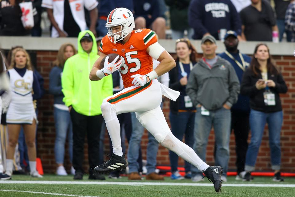 Nov 12, 2022; Atlanta, Georgia, USA; Miami Hurricanes tight end Will Mallory (85) catches a pass for a touchdown against the Georgia Tech Yellow Jackets in the first quarter at Bobby Dodd Stadium. Mandatory Credit: Brett Davis-USA TODAY Sports