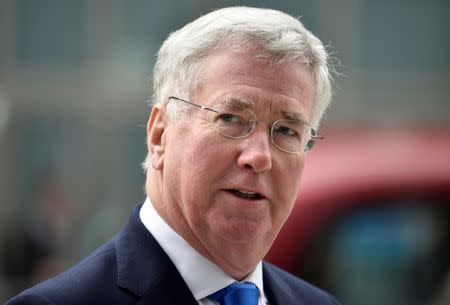 British Defence Secretary Michael Fallon arrives at the National Cyber Security Centre in London, Britain, February 14, 2017. REUTERS/Hannah McKay/Files
