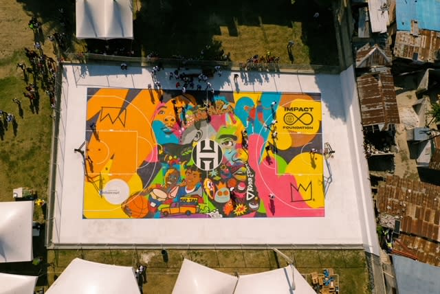 James Harden partnered with Barbancourt Foundation Haiti and local artist Olivier A. Ganthier and Elliot Gerard to supply a new basketball court that features Ganthier’s creative artwork. (Provided by James Harden's Impact 13 Foundation)