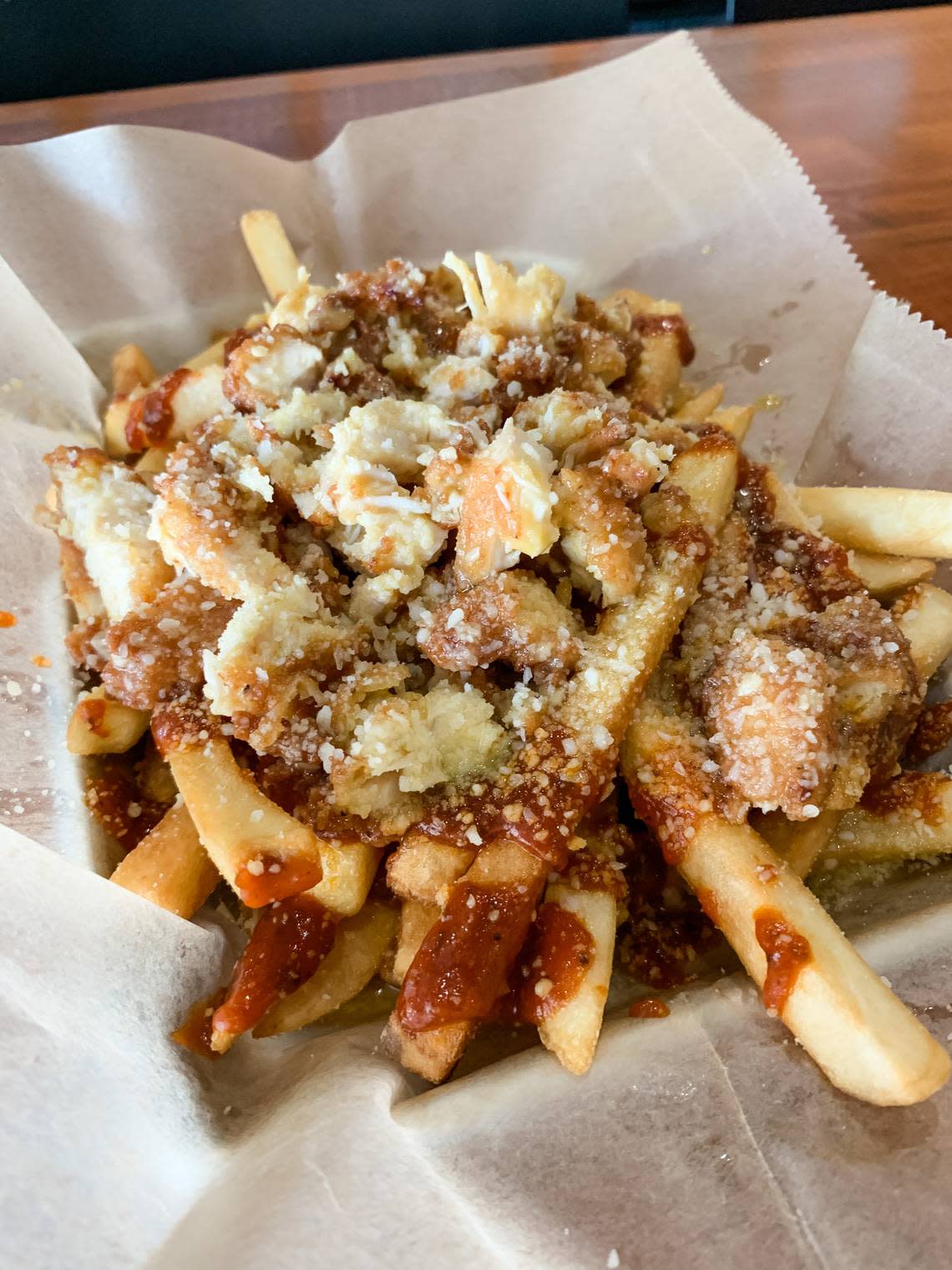 Here’s Biddy’s entry for the Downtown Macon French Fry Fight on Wednesday: Their garlic Parmesan loaded fries, fried chicken tossed in garlic Parmesan sauce, topped with shredded Parmesan cheese and marinara sauce.