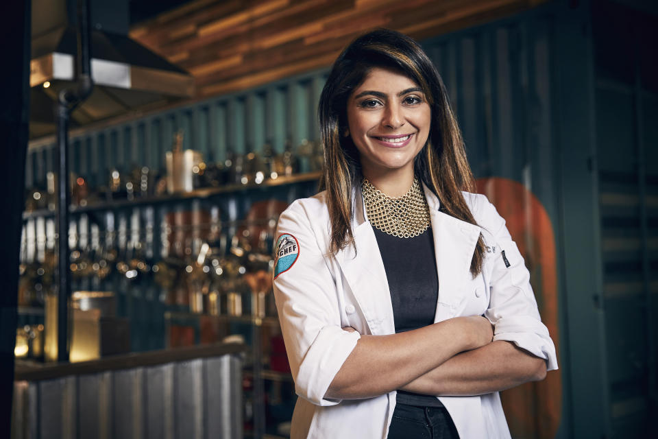 This photo released by Bravo shows cooking contestant Fatima Ali during season 15 of the competition series, "Top Chef," on May 9, 2017. Ali died of cancer on Jan. 25. She was 29. (Tommy Garcia/Bravo via AP)
