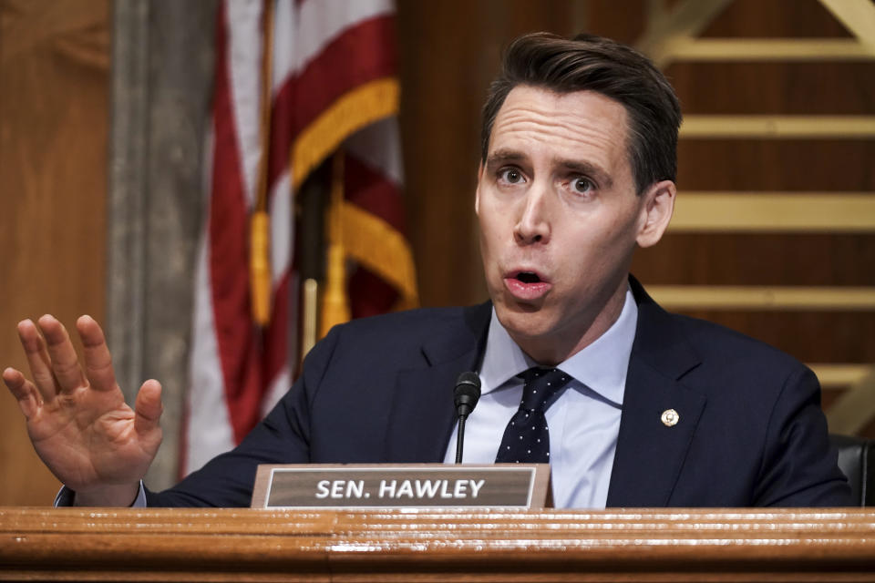 FILE - In this Dec. 16, 2020 file photo, Sen. Josh Hawley, R-Mo., asks questions during a Senate Homeland Security & Governmental Affairs Committee hearing to discuss election security and the 2020 election process on Capitol Hill in Washington.  Walmart apologized on Wednesday, Dec. 30, for a tweet that called Hawley a sore loser for contesting the U.S. presidential election. The tweet from Walmart was in response to Hawley’s tweet announcing his plans to raise objections next week when Congress meets to affirm President-elect Joe Biden’s victory in the election.  (Greg Nash/Pool via AP, File)