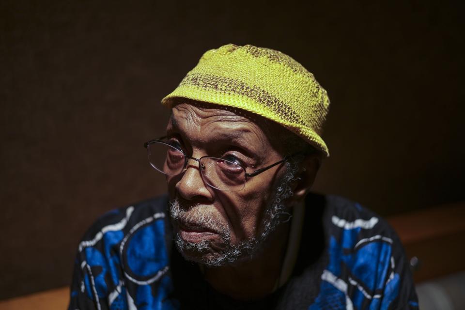 Poet Charles "Is Said" Lyons poses for a portrait on Wednesday, July 21, 2021 at the Lincoln Theatre in Columbus, Ohio. Lyons was inducted into the theatre's "Walk of Fame."