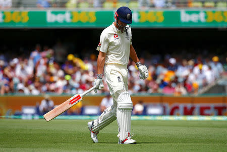 Cricket - Ashes test match - Australia v England - GABBA Ground, Brisbane, Australia, November 23, 2017. England's Alastair Cook reacts as he walks off after being dismissed during the first day of the first Ashes cricket test match. REUTERS/David Gray