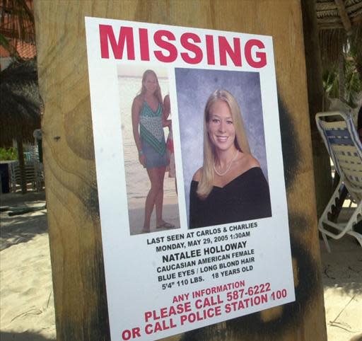 Poster with two images of Natalee Holloway, reading at top in red block letters: Missing