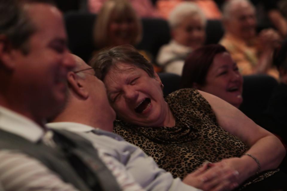 Audience members laugh while watching a performance at Marvyn's Magic Theater on Sunday, Feb. 23, 2020 in La Quinta, Calif.