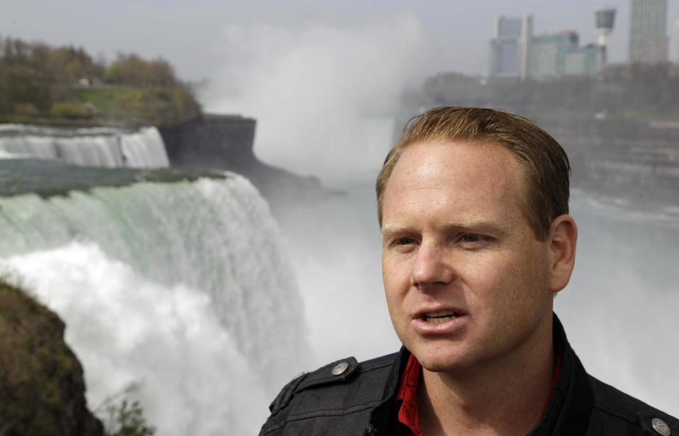 Nik Wallenda speaks after a news conference in Niagara Falls, N.Y., Wednesday, May 2, 2012. Wallenda will try to cross the Niagara Gorge on a tightrope June 15. The seventh-generation member of the Flying Wallendas spent months getting the necessary permissions from Canada and the United States for the cross-border stunt. (AP Photo/David Duprey)