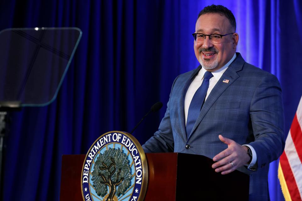 Education Secretary Miguel Cardona delivers remarks at the department's building on Jan. 27, 2022.