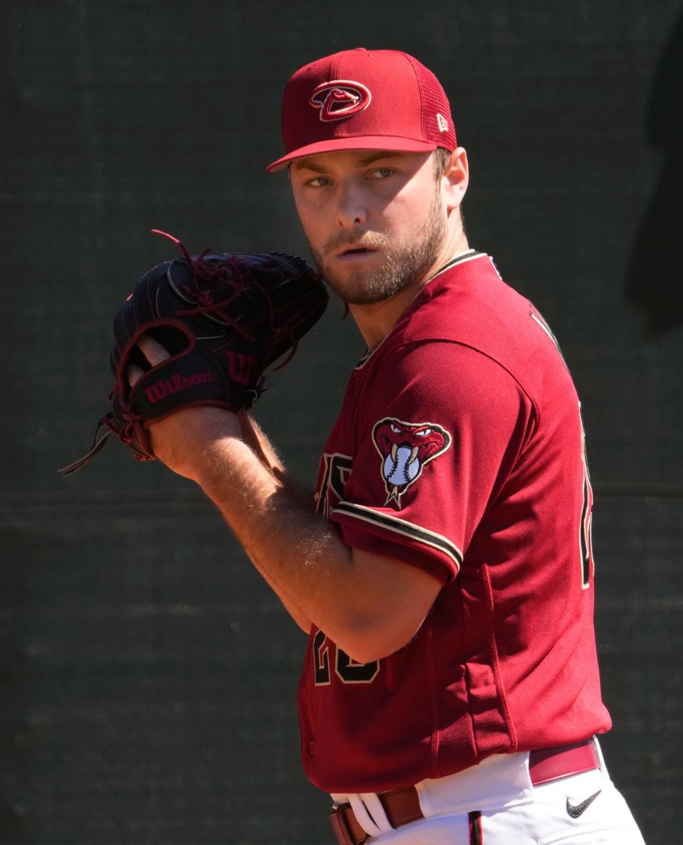 Mar 14, 2022; Scottsdale, AZ, USA; Arizona Diamondbacks pitcher Corbin Martin throws in the bullpen during spring training practice at Salt River Fields.