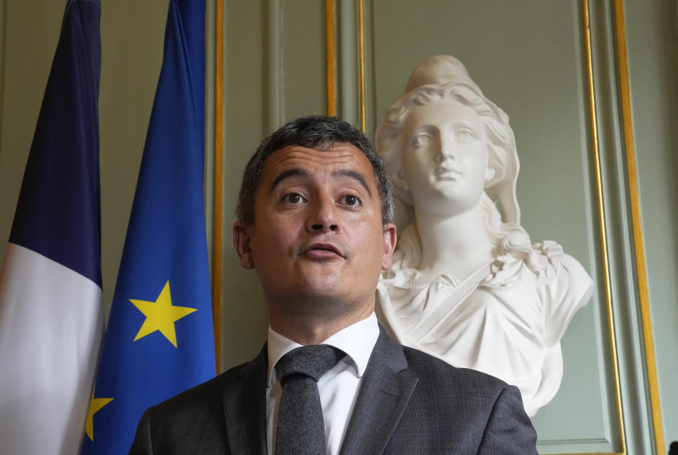 FILE - French Interior Minister Gerald Darmanin gestures during a media conference at the Interior Ministry in Paris, May 25, 2021. French authorities are sending police special forces to the Caribbean island of Guadeloupe, an overseas territory of France, as protests over COVID-19 restrictions erupted into rioting. Interior Minister Gerald Darmanin denounced “unacceptable” violence in an interview with Le Parisien newspaper that was published Sunday, Nov. 21, 2021. (AP Photo/Michel Euler, file)