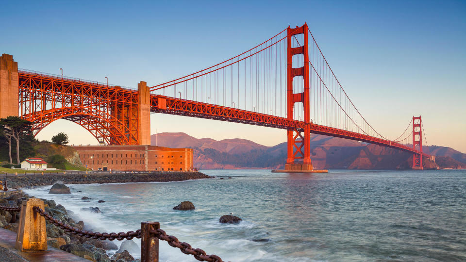 Image of Golden Gate Bridge in San Francisco, California during sunrise.