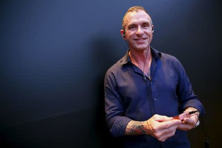 Jerry Harvey of the U.S., a sound engineer who pioneered the invention of earbuds in a series of customized in-ear monitors for rock band Van Halen in the nineties, poses for a portrait during the CanJam headphone and personal audio expo in Singapore February 21, 2016. REUTERS/Edgar Su